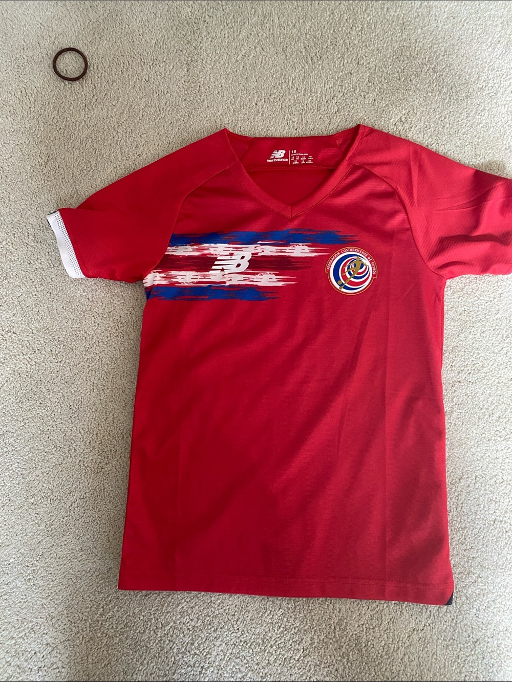 New Balance Red Soccer Jersey with Blue and White Accent